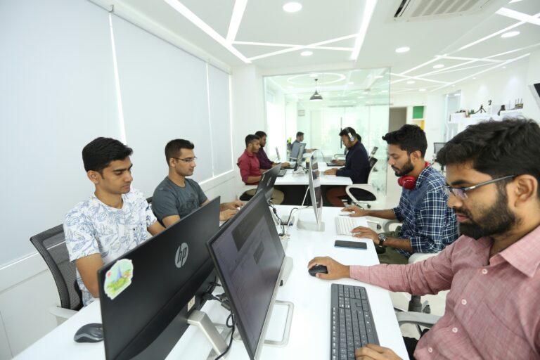 Indian software engineers working in a modern office, reflecting the deep-tech talent pool startups aim to hire in India